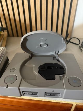 Consola PlayStation 1 con juegos
