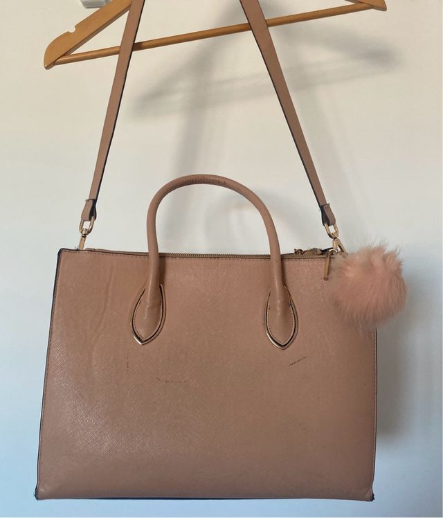 Bolso rosa H&M con pompón