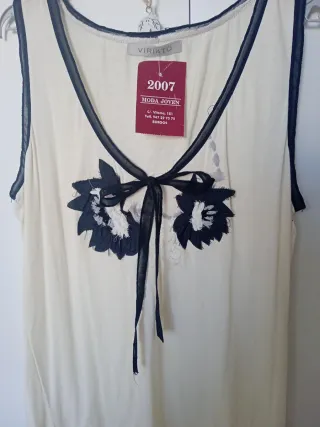 Camiseta M con flores y lazo