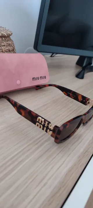 Óculos de Sol Miu Miu padrão Tartaruga