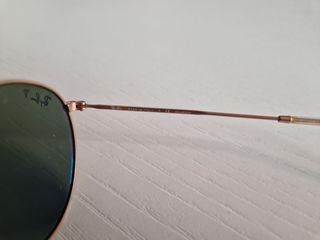 Gafas de sol Ray Ban doradas y azules