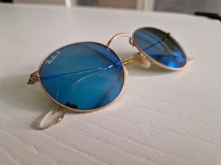 Gafas de sol Ray Ban doradas y azules
