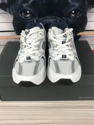 Zapatillas       530      NB      blancas talla 40