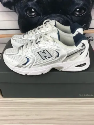Zapatillas       530      NB      blancas talla 40