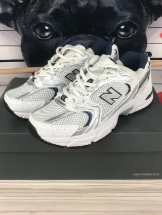Zapatillas       530      NB      blancas talla 40