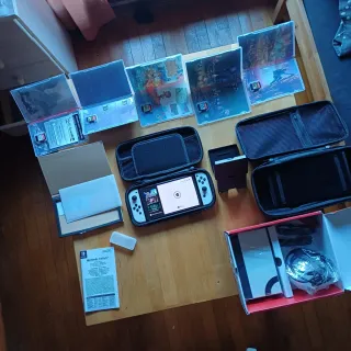 Nintendo Switch OLED + 5 Giochi