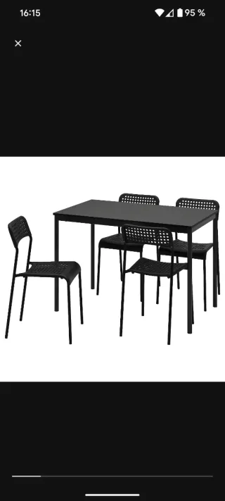 Mesa de cocina y 4 sillas negras