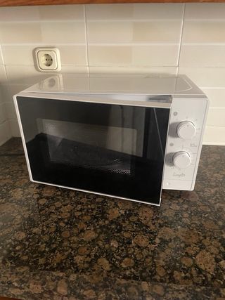 Sofá modular tela y mesa cristal