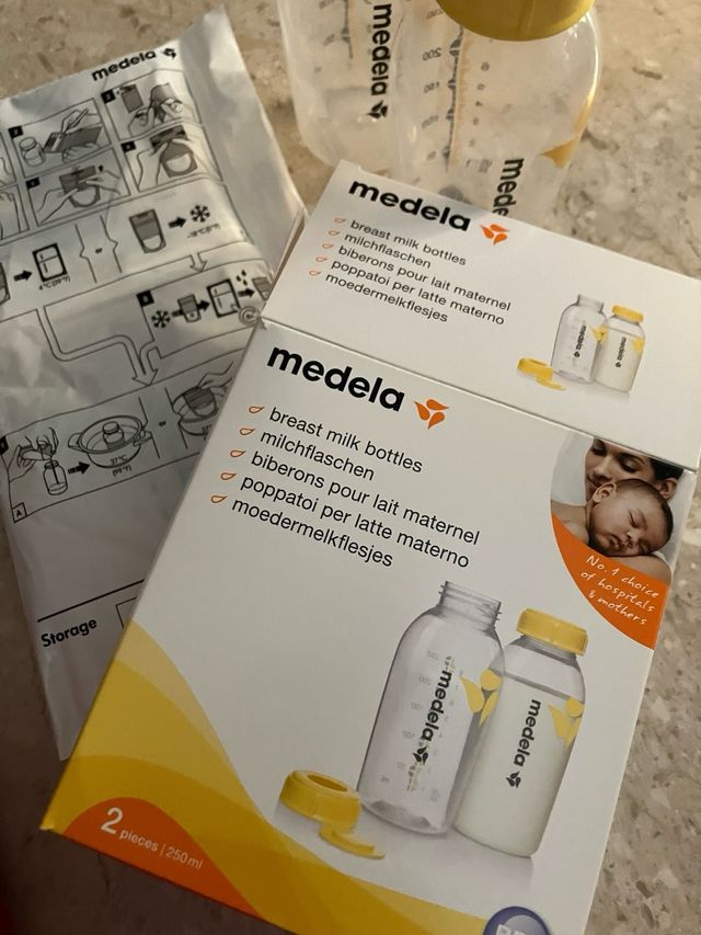 Tiralatte Medela Elettrico Swing e bottiglie