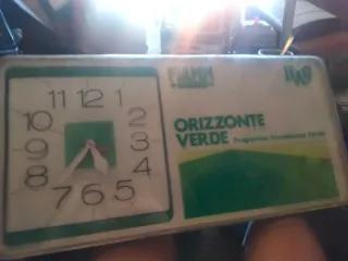 Cartel  con reloj vintage años 70