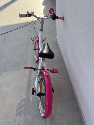 Bicicleta niña Btwin rosa y blanca