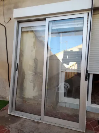 Ventana balconera corredera