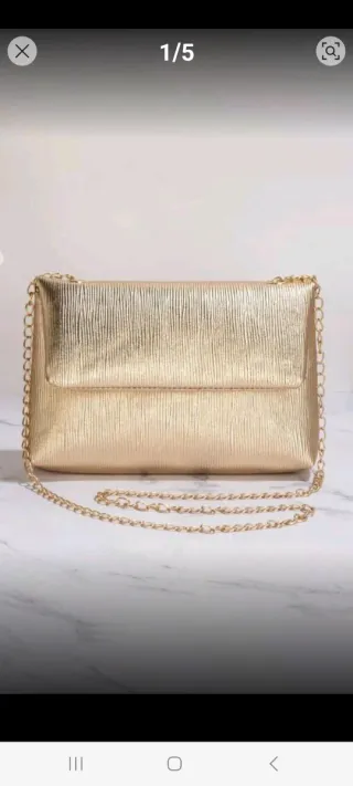 Bolso de fiesta dorado con cadena