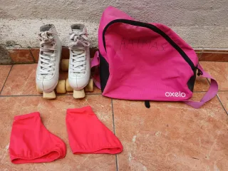 Patines Oxelo blancos con bolsa y fundas