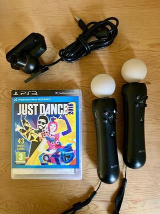 Consola PS3 con 5 mandos, cámara y guitarra