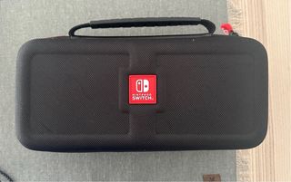 Nintendo Switch OLED + Mario Kart 8 Deluxe + funda