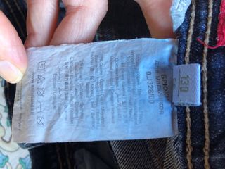 Jeans bimbo strappati blu