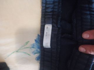 Pantalones deportivos azul y gris