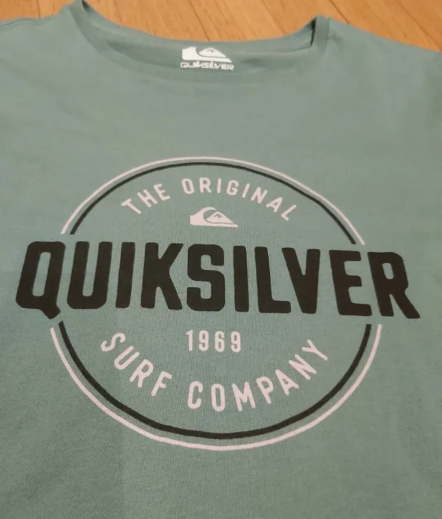 Camiseta verde talla 12 - 13 años.