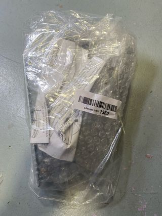 Capa de aspiración para amoladora