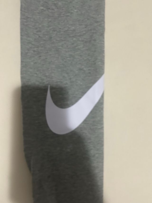 Mallas Nike grises con logo