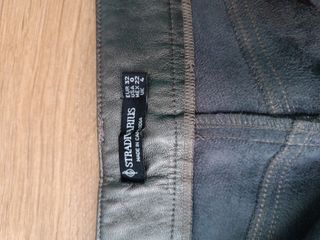Pantalón símil piel Stradivarius plateado