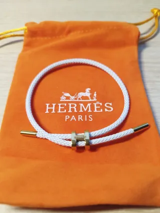 Pulsera Hermès Blanca con H Dorada