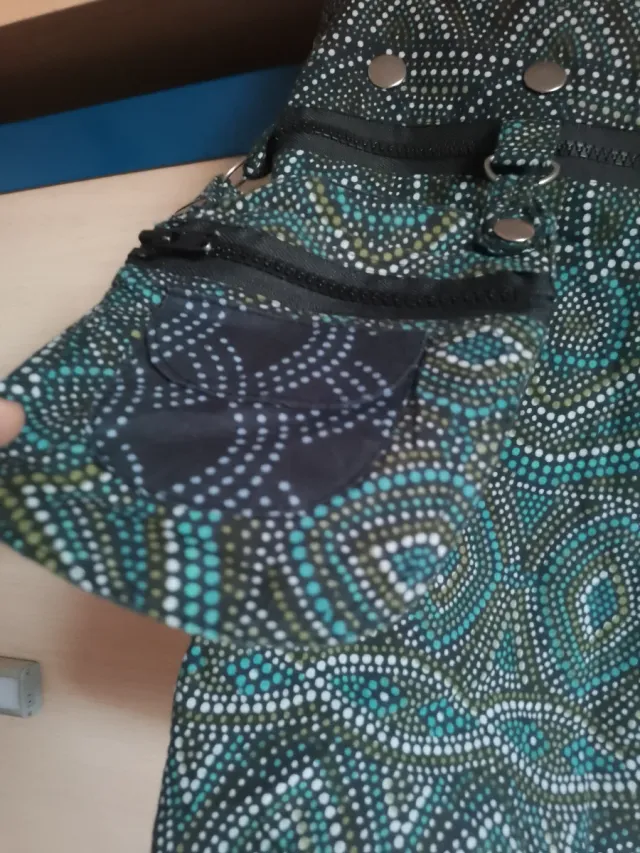 Falda ajustable con corchetes y reversible