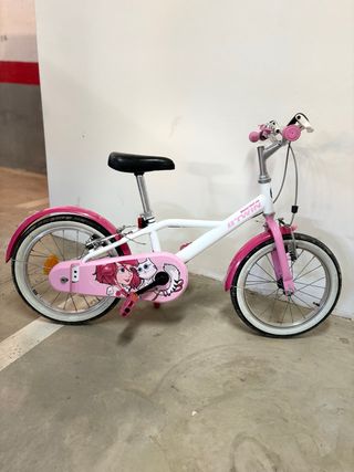 Bicicleta infantil Btwin rosa y blanca
