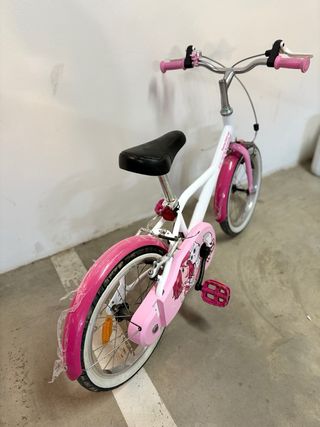 Bicicleta infantil Btwin rosa y blanca