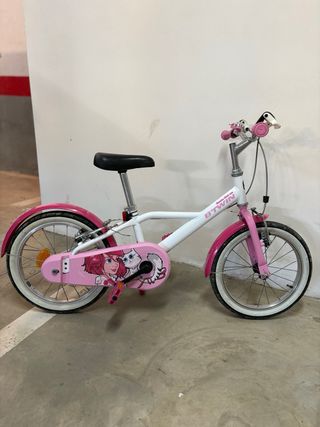 Bicicleta infantil Btwin rosa y blanca