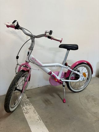Bicicleta infantil Btwin rosa y blanca