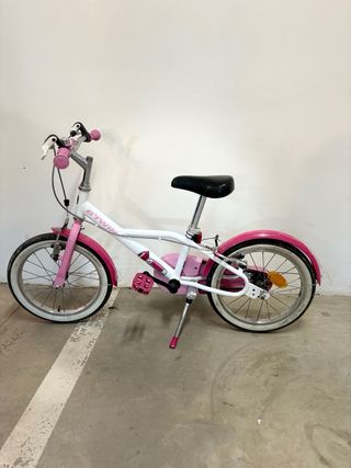 Bicicleta infantil Btwin rosa y blanca