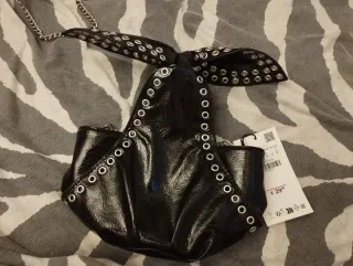 Bolso negro lazo con ojales