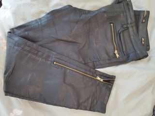 Pantalón poliéster, algo elastico
