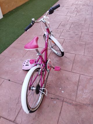 Bicicleta Btwin Rosa 20 pulgadas 
con marchas