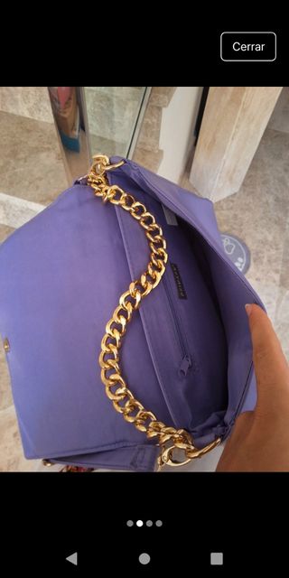 Bolso lila acolchado