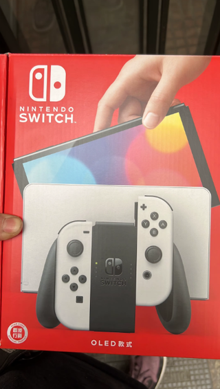 Switch OLED nueva + Zelda BOTW