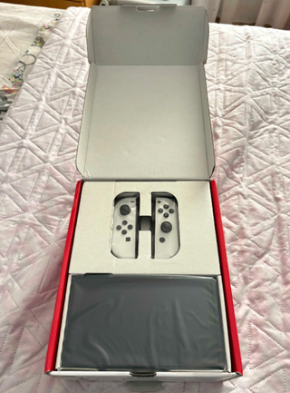 Switch OLED nueva + Zelda BOTW