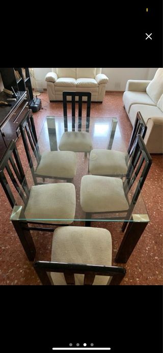 Mesa de cristal con 6 sillas