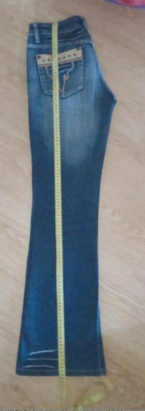 Vaqueros acampanados Leño Talla S