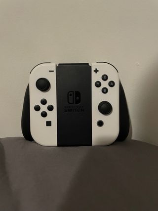 Nintendo Switch OLED White — Come nuovo e cover 