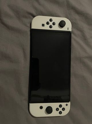 Nintendo Switch OLED White — Come nuovo e cover 