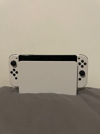 Nintendo Switch OLED White — Come nuovo e cover 