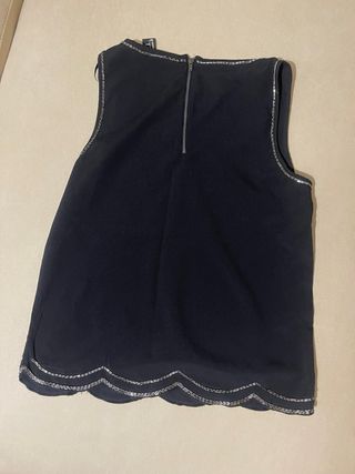 Blusa H&M sin mangas con detalles plateados