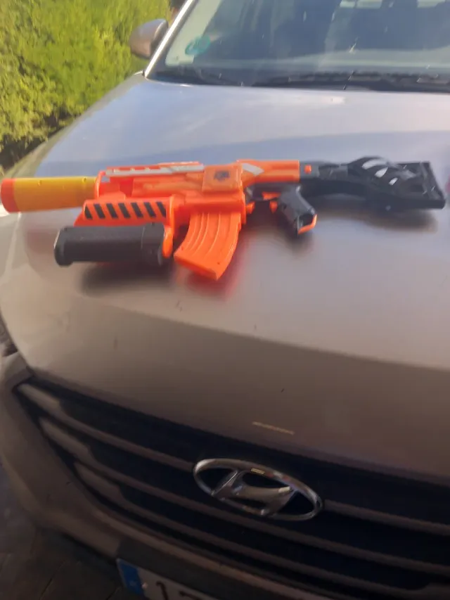 Pistola de Juguete Naranja y Negra