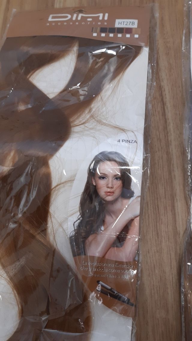 2 extensiones de cabello.