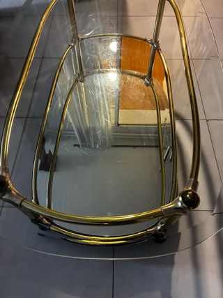 Mesa de centro cristal y metal dorado