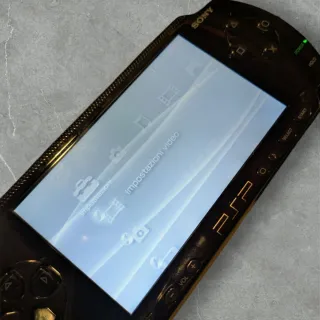 Sony PSP Fat Nera con custodia e giochi