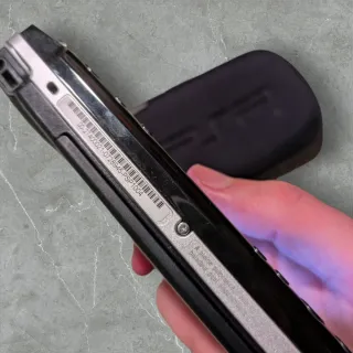 Sony PSP Fat Nera con custodia e giochi